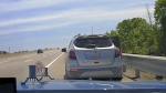 This still from a video shows a car driven by a child during a police chase on a Michigan highway on May 27, 2023.  (Source: Michigan State Police Third District via Storyful)