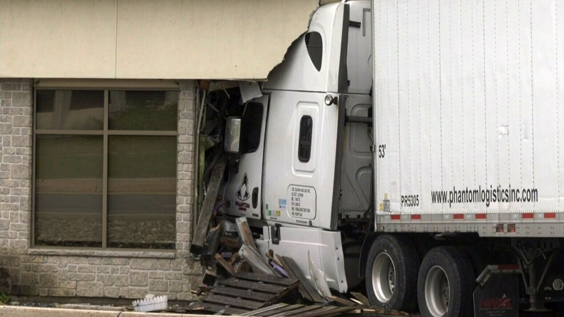 Tractor trailer crashes into N.B. animal hospital