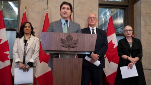 Defence Minister Anita Anand, Emergency Preparedness Minister Bill Blair and Indigenous Services Minister Patty Hajdu look on as Prime Minister Justin Trudeau speaks during a news conference, in Ottawa, Wednesday, June 7, 2023. THE CANADIAN PRESS/Adrian Wyld
