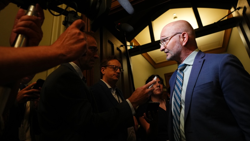 Justice Minister David Lametti speaks to reporters after a meeting of the Liberal caucus in Ottawa, Wednesday, May 31, 2023. THE CANADIAN PRESS/Sean Kilpatrick