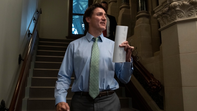 Prime Minister Justin Trudeau speaks briefly with reporters as he makes his way to a cabinet meeting, Wednesday, June 7, 2023 in Ottawa. THE CANADIAN PRESS/Adrian Wyld