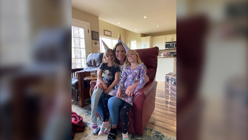 Courtney Johnson and her two daughters, Taylor and Hayley, died in a traffic accident on Highway 3 on June 1. (Photo courtesy: McPherson Funeral Service)