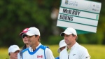 Rory McIlroy, right, looks on after hitting his tee shot on the tenth hole during the Canadian Open Pro-Am in Toronto on June 7, 2023. (Nathan Denette / THE CANADIAN PRESS)