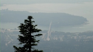 The Lions Gate Bridge between Vancouver and the North Shore is partially obscured by wildfire smoke on Wednesday, June 7, 2023. (CTV)