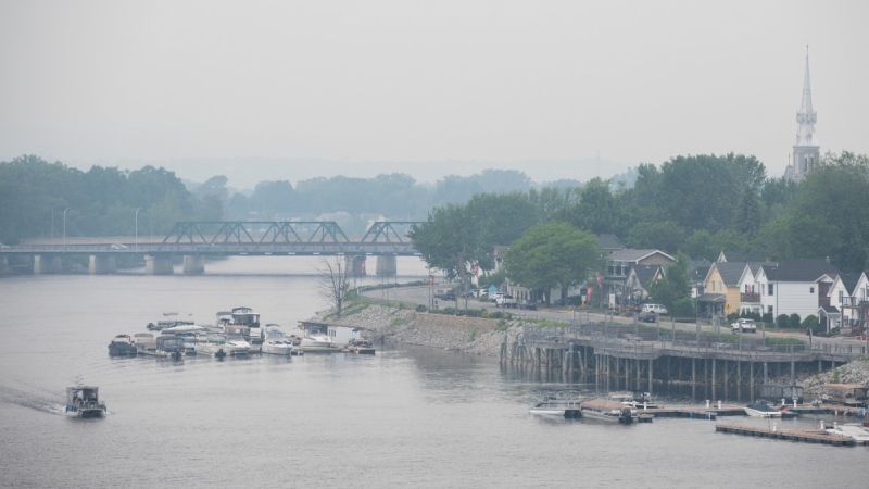 A general view of wildfire smoke is seen over Gatineau, Que. from Rockcliffe Lookout in Ottawa as wildfire smoke engulfs the region, on Wednesday, June 7, 2023. THE CANADIAN PRESS/Spencer Colby