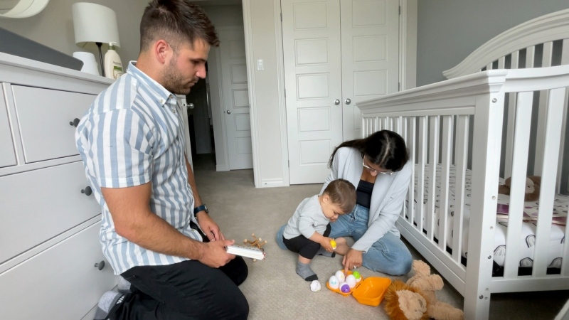Joey and Sabrina Pasqua at their Ottawa home. The Ottawa family extended their mortgage commitment to 30 years. (Dave Charbonneau/CTV News Ottawa) 