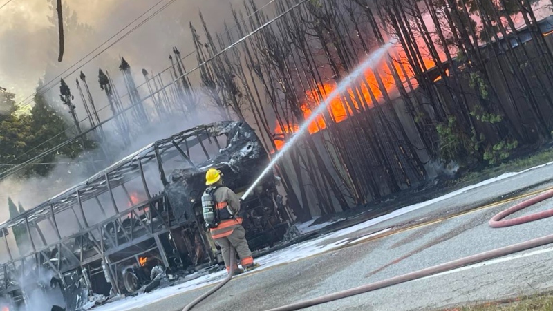 A bus carrying schoolchildren caught fire in Chilliwack, B.C. on June 8, 2023. (Photo submitted by Angela Bergen) 
