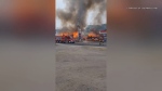 Fire broke out at Toppers Convenience in Verona, Ont. on Wednesday. Witnesses reported hearing fireworks inside the store as the building burned. (Stephen Clow/CTV viewer video)