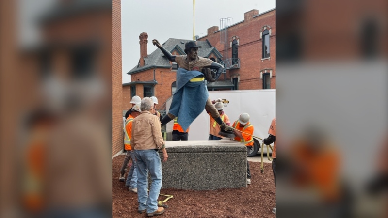 Clarke Construction team installing Fergie Jenkins statue on June 8, 2023. (Source: Submitted)