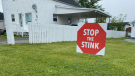 A "stop the stink" sign is seen in the Beaurivage community. (CTV Atlantic/Derek Haggett)