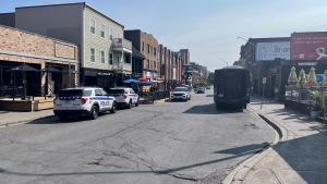 Ottawa police cruisers parked on Clarence Street as the investigation continues into an overnight shooting. Police say four men were shot in the shooting at an establishment in the ByWard Market. (Josh Pringle/CTV News Ottawa)