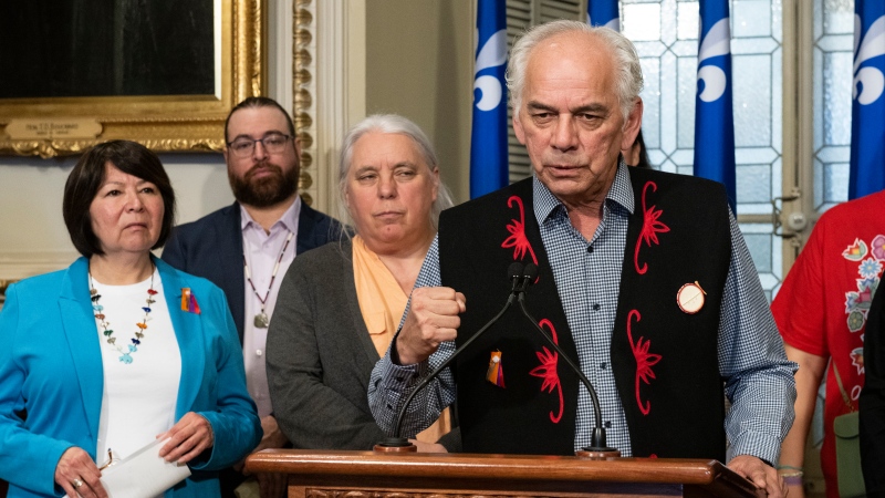 Ghislain Picard, Chief of the AFNQL speaks at a news conference after a petition calling on the Quebec government to recognize the existence of systemic racism and discrimination was tabled, at the legislature in Quebec City, Thursday, March 16, 2023. Quebec Solidaire co-spokesperson Manon Masse, third from left, and Marjolaine Etienne, far left, President of Quebec Native Women look on. THE CANADIAN PRESS/Karoline Boucher