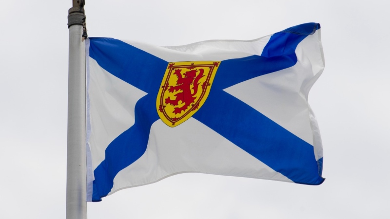 Nova Scotia's provincial flag flies on a flag pole in Ottawa, July 3, 2020. THE CANADIAN PRESS/Adrian Wyld