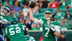 Saskatchewan Roughriders quarterback Trevor Harris (7) throws against the Winnipeg Blue Bombers during the first half of CFL football action in Regina, on Friday, June 16, 2023. THE CANADIAN PRESS/Heywood Yu 