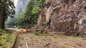 Debris is strewn across Highway 4 on Vancouver Island in a Tuesday, June 13, 2023. THE CANADIAN PRESS/HO-B.C. Ministry of Transportation and Infrastructure