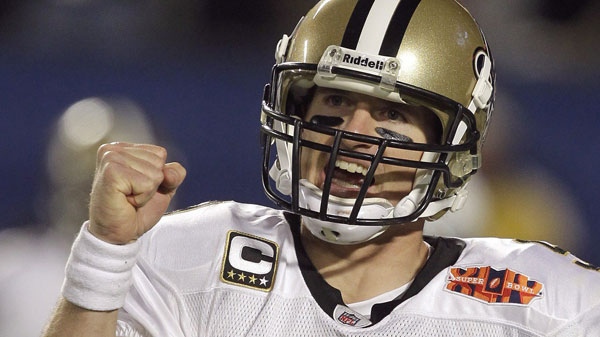 New Orleans Saints quarterback Drew Brees (9) calls for a 2-point conversion after a touchdown against the Indianapolis Colts during the second half of the NFL Super Bowl XLIV football game in Miami, Sunday, Feb. 7, 2010. (AP / Julie Jacobson)