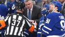 Toronto Maple Leafs head coach Sheldon Keefe argues with referee Pierre Lambert (37) during second period NHL hockey action against the Florida Panthers in Toronto on Tuesday, January 17, 2023. THE CANADIAN PRESS/Nathan Denette