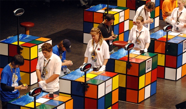 Players compete in solving Rubik's cubes during the final of the 2007 Rubik's Cube World Championships in Budapest, Hungary, Sunday, Oct. 7, 2007. (AP / Bela Szandelszky)