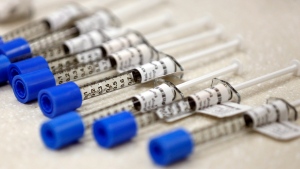 File photo shows syringes of the opioid painkiller fentanyl in an inpatient pharmacy. (AP Photo/Rick Bowmer, File)