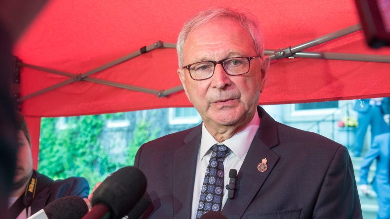 New Brunswick Premier Blaine Higgs is seen speaking to media outside Government House following a cabinet shuffle, in Fredericton, Tuesday, June 27, 2023. THE CANADIAN PRESS/Stephen MacGillivray