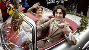 Newly married Justin Trudeau and Sophie Gregoire leave a 1959 Mercedes 300 SEL after their marriage ceremony in Montreal, Saturday, May 28, 2005. The car belonged to Trudeau’s father, the late prime minister Pierre Elliott Trudeau. (CP PHOTO/Ryan Remiorz)