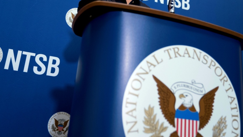 The logo for the U.S. National Transportation Safety Board is seen during a news conference at the National Transportation Safety Board headquarters in Washington, Dec. 18, 2017. (AP Photo/Andrew Harnik, File)
