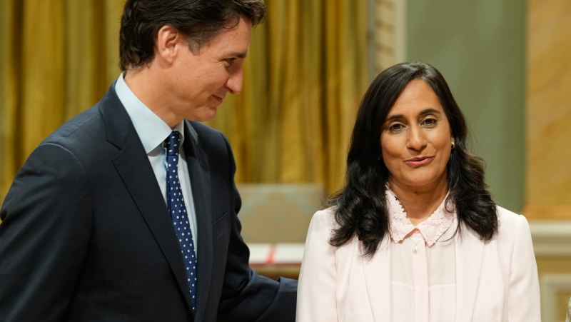 Prime Minister Justin Trudeau looks at Anita Anand after she was sworn in as the President of the Treasury Board during a cabinet shuffle, in Ottawa, Wednesday, July 26, 2023. THE CANADIAN PRESS/Adrian Wyld