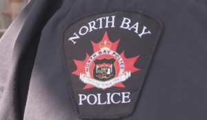 North Bay Police Service crest on an officer's uniform. (File photo)