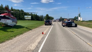 Emergency crews, police and an air ambulance attend the scene of a fatal multi-vehicle crash on County Road 124 in Melancthon Township on Tues., Aug. 22, 2023. (Source: OPP/Twitter)