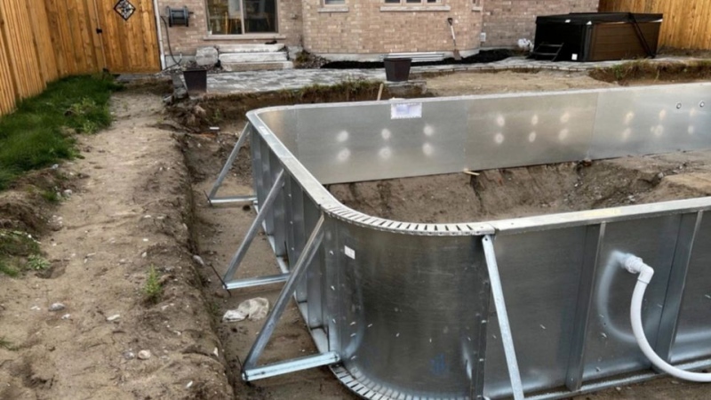 An unfinished pool is pictured in a backyard with the homeowner alleging Sommerland Pool and Landscaping never completed the project. (Supplied)