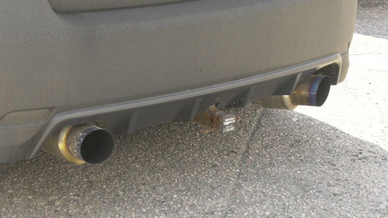 An aftermarket muffler on a vehicle in Pembroke, Ont. OPP say they will be cracking down on excessive noise until Sept. 1. (Dylan Dyson/CTV News Ottawa)