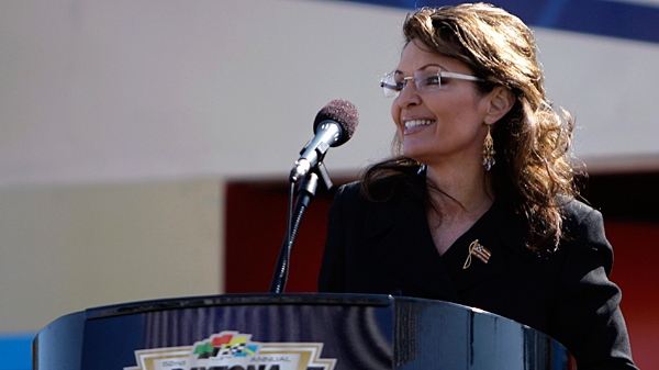 Former Alaska Gov. Sarah Palin greets fans prior to the start of the Daytona 500 NASCAR auto race at Daytona International Speedway in Daytona Beach, Fla., Sunday, Feb. 14, 2010. (AP / John Raoux