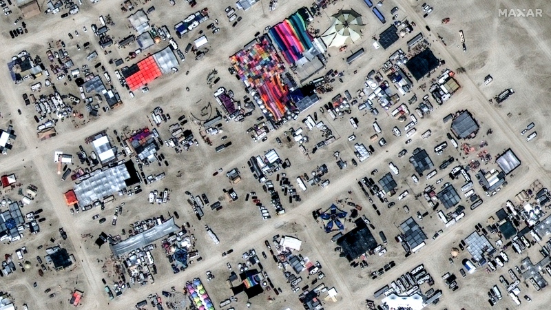 In this satellite photo provided by Maxar Technologies, an overview of Burning Man festival in Black Rock, Nev on Aug. 27, 2023. (©2023 Maxar Technologies via AP)