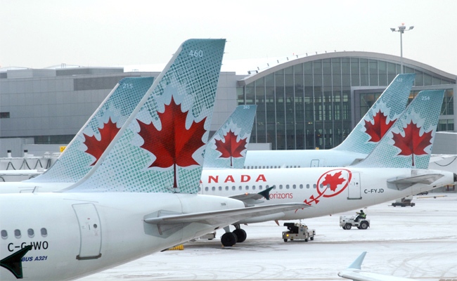 Air Canada planes are shown in a file image.