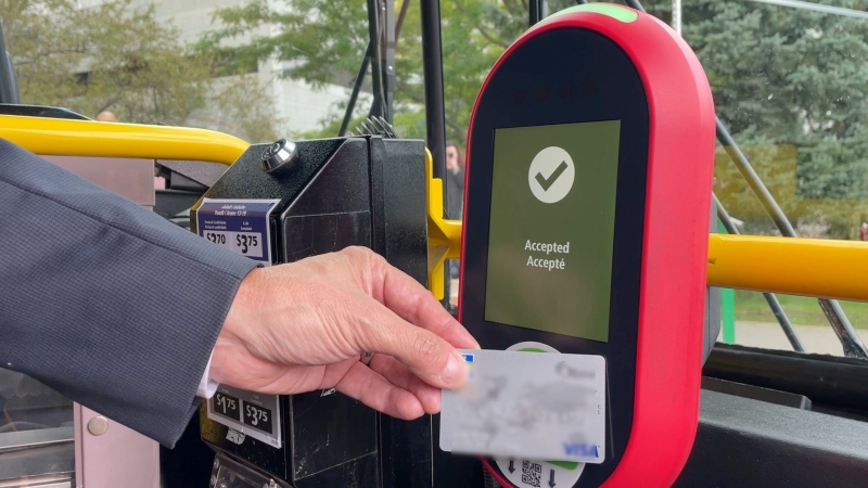 An OC Transpo user paying for a transit fare. (Dave Charbonneau/CTV News Ottawa) 
