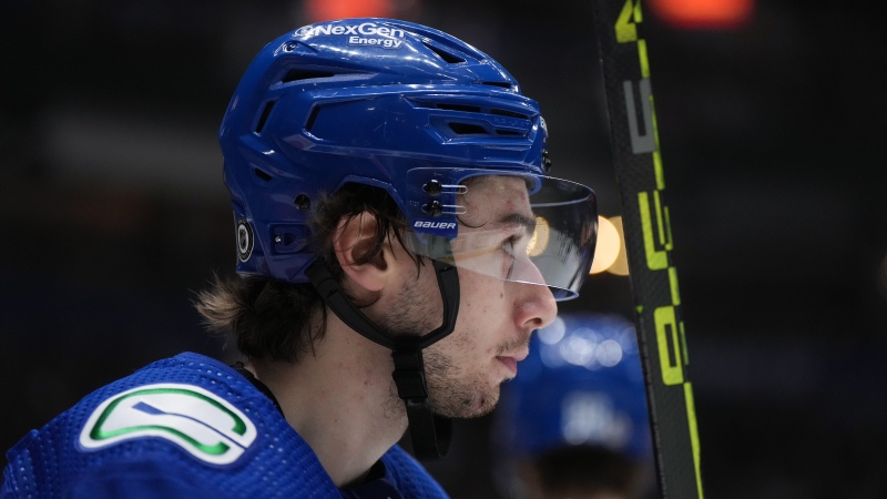 Vancouver Canucks' Quinn Hughes waits for a faceoff during the second period of an NHL hockey game against the Seattle Kraken in Vancouver, on Tuesday, April 4, 2023. THE CANADIAN PRESS/Darryl Dyck