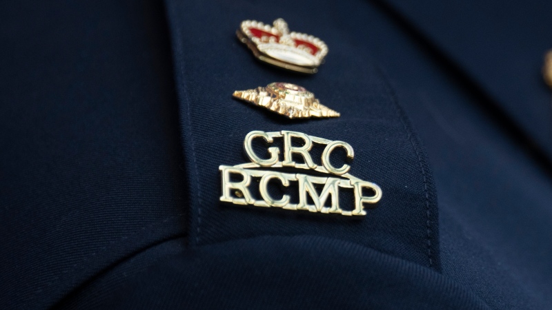 The RCMP logo is seen on the shoulder of a superintendent during a news conference, Saturday, June 24, 2023 in St. John’s, Newfoundland. THE CANADIAN PRESS/Adrian Wyld
