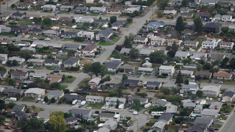 Houses are seen in an aerial view in a residential neighbourhood, in Kamloops, B.C., Sept. 11, 2023. THE CANADIAN PRESS/Darryl Dyck