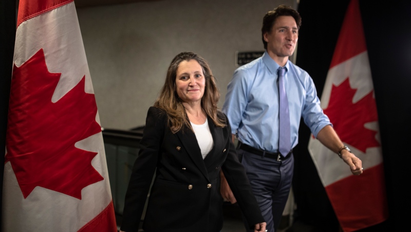 Deputy Prime Minister and Finance Minister Chrystia Freeland, along with Prime Minister Justin Trudeau, arrive at the Hamilton Convention Centre, in Hamilton, Ont., ahead of the Liberal Cabinet retreat, on Monday, January 23, 2023. THE CANADIAN PRESS/Nick Iwanyshyn