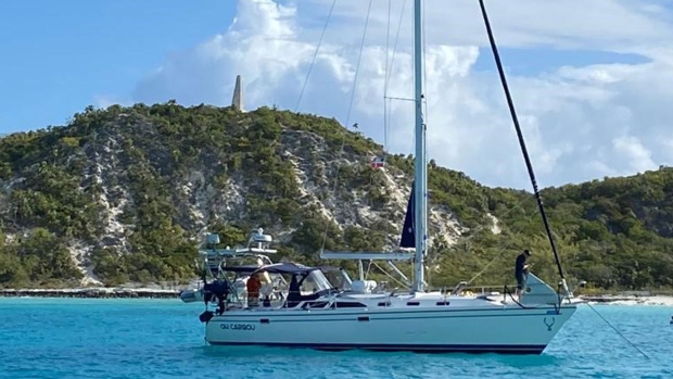 A sailboat owned by Hamilton, Ont. couple Steve Easson and Ben Roth is pictured off the coast of Grenada. The pair left their house and sold everything they own to sail the world. (Supplied/Steve Easson)