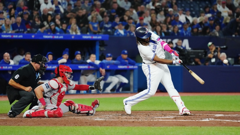 Toronto Blue Jays' Vladimir Guerrero Jr. hits a three-run home run against the Boston Red Sox during third inning American League MLB baseball action in Toronto on Friday, September 15, 2023. THE CANADIAN PRESS/Chris Young
