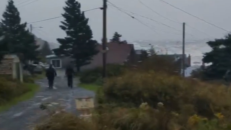 A Nova Scotia resident recorded the scenes while trying to stay on her feet due to high winds.