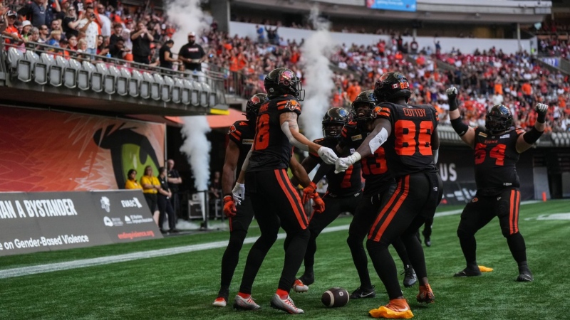B.C. Lions' Justin McInnis (18), Lucky Whitehead (7), Alexander Hollins (13), Jevon Cottoy (86), Andrew Peirson (54) and Keon Hatcher (4) celebrate McInnis' touchdown during the first half of a CFL football game against the Ottawa Redblacks, in Vancouver, B.C., Saturday, Sept. 16, 2023. THE CANADIAN PRESS/Darryl Dyck