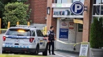 Police at the scene of a 'targeted' shooting in Burnaby on Sept. 16, 2023. 