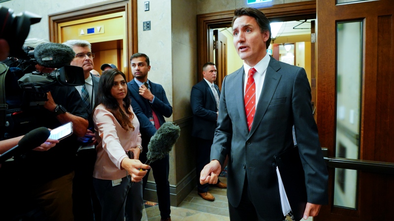Prime Minister Justin Trudeau pauses to speak to reporters as he makes his way to the House of Commons on Parliament Hill in Ottawa on Monday, Sept. 18, 2023. MPs returned today following the summer recess. THE CANADIAN PRESS/Sean Kilpatrick