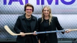 Ottawa's Savannah Harmon, right, from the PWHPA, poses for a photo with former American tennis player Billie Jean King after being selected fifth overall during the first round of the inaugural Professional Women’s Hockey League draft in Toronto, on Monday, Sept. 18, 2023. (Spencer Colby/THE CANADIAN PRESS) 