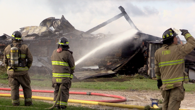 A pig barn burned to the ground on the morning of Sept. 18, 2023 near Wingham, Ont. An unknown number of pigs perished in the blaze which closed a section of Highway 86 between Wingham and Whitechurch for five hours. (Scott Miller/CTV News London)