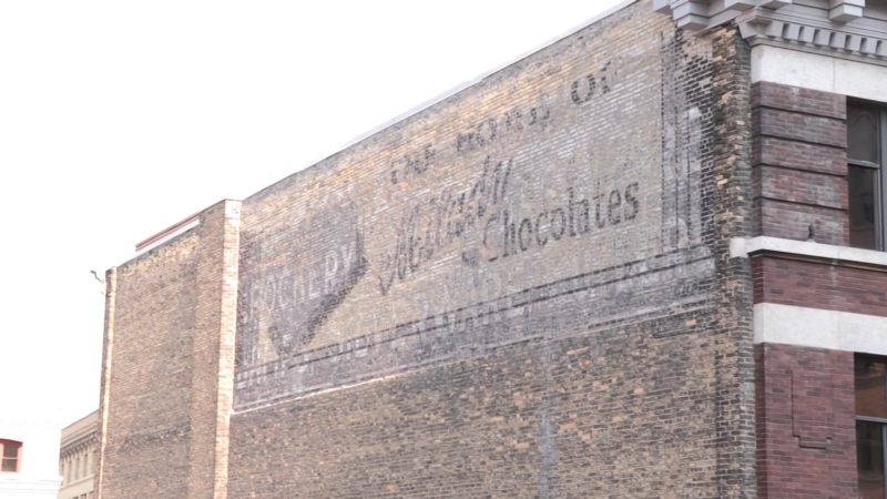 The Milady Chocolate ghost sign in Winnipeg's Exchange District will see light applied to recreate the sign during Nuit Blanche 2023. (Image source: Jamie Dowsett/CTV News Winnipeg)