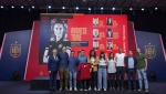 Spain's new women's national team coach Montse Tome, center, holds a jersey during her official presentation with her technical staff at the Spanish soccer federation headquarters in Las Rozas, just outside of Madrid, Spain, Monday, Sept. 18, 2023. Tome replaced Jorge Vilda less than three weeks after Spain won the Women's World Cup title and amid the controversy involving suspended federation president Luis Rubiales who has now resigned. (AP Photo/Manu Fernandez)