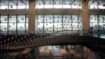 A kinetic structure is suspended from the ceiling of the Changi International Airport on Wednesday July 4, 2012 in Singapore. (AP Photo/Wong Maye-E)